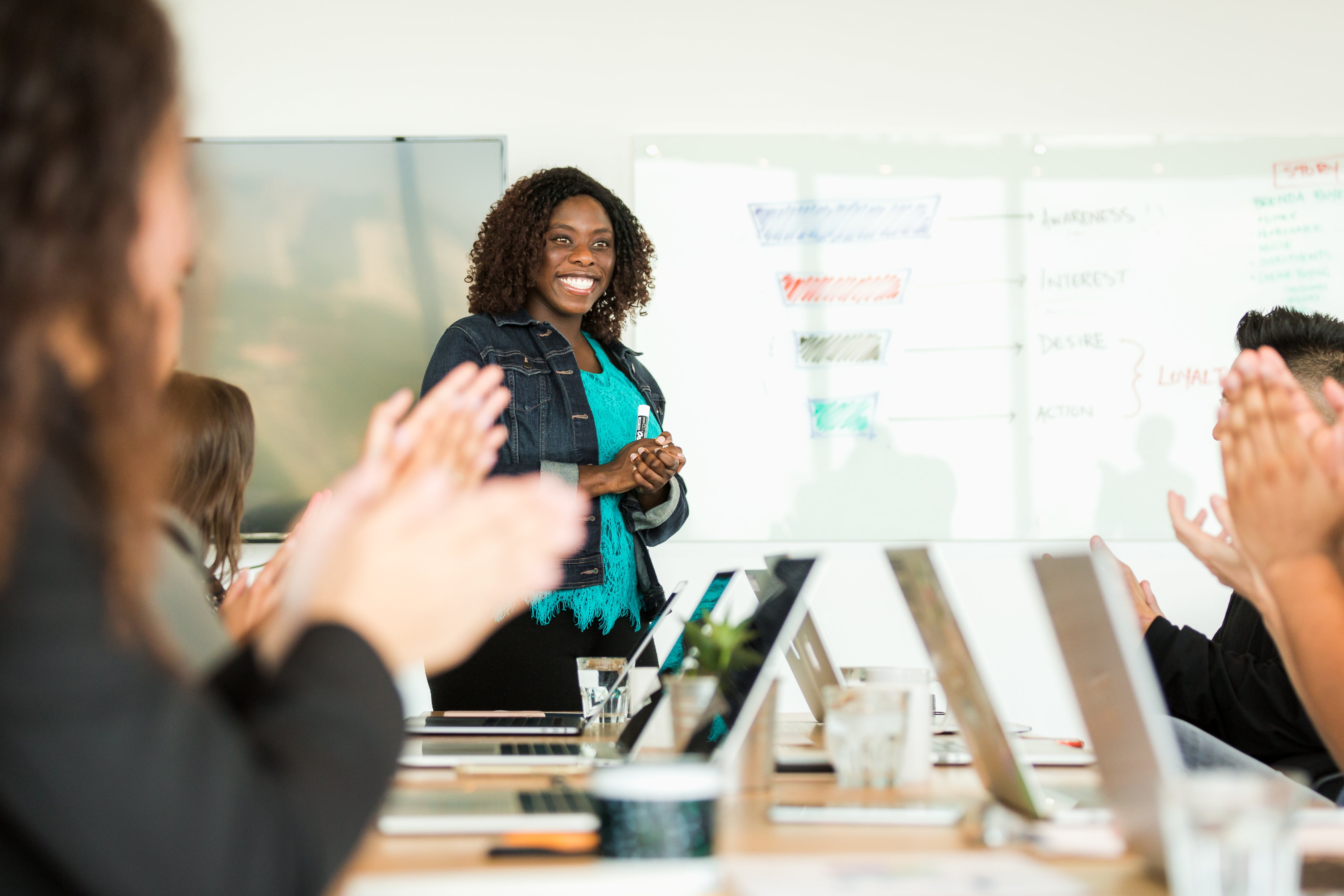 files/smiling-woman-leading-meeting.jpg